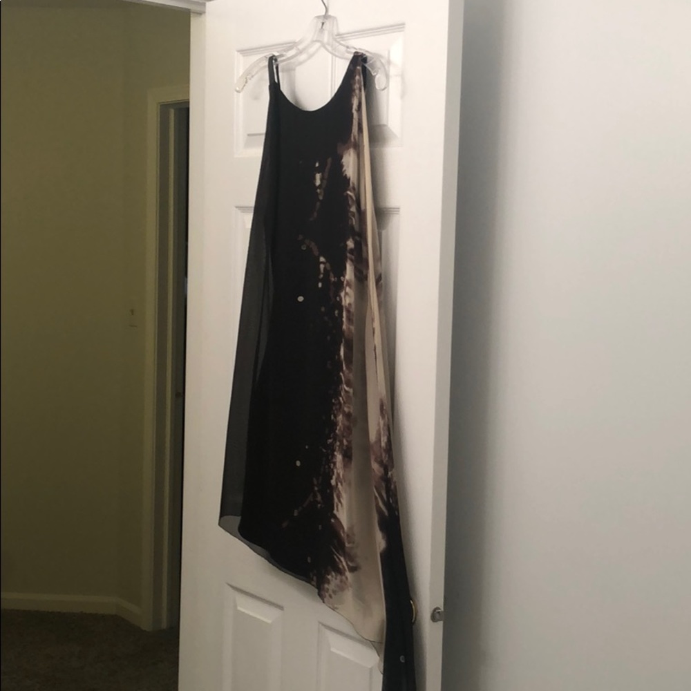100% silk cocktail dress.Leon Max limited edition